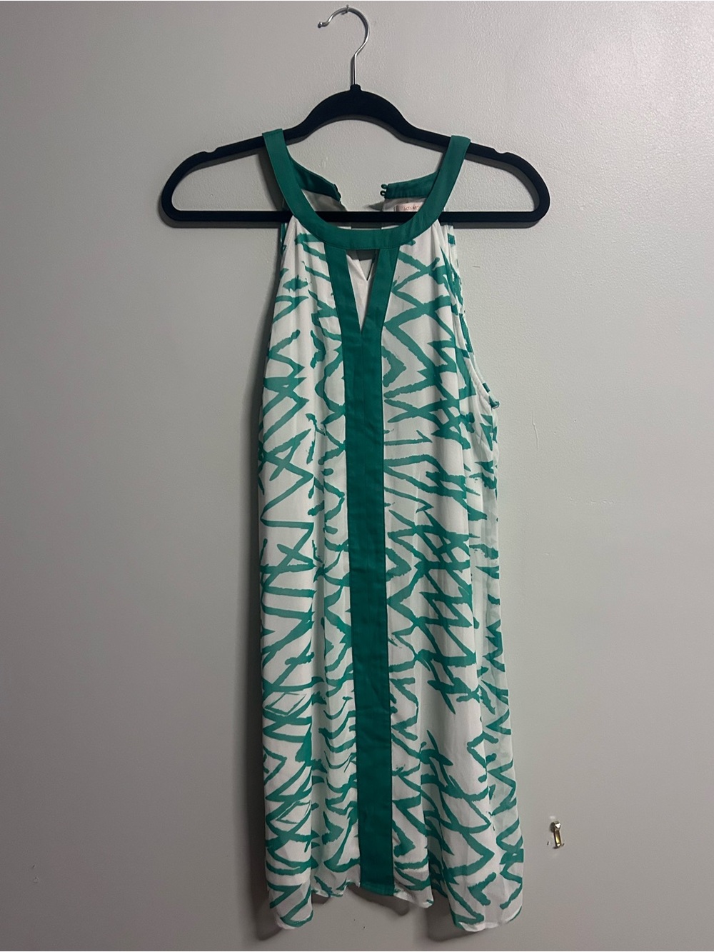 Sleeveless White Mini Dress with Teal Geometric Print